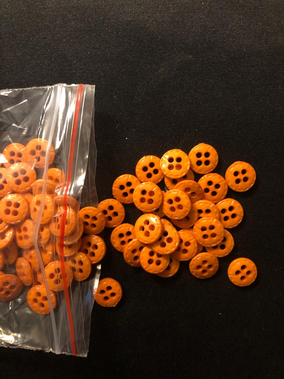 ORANJ DÜGME